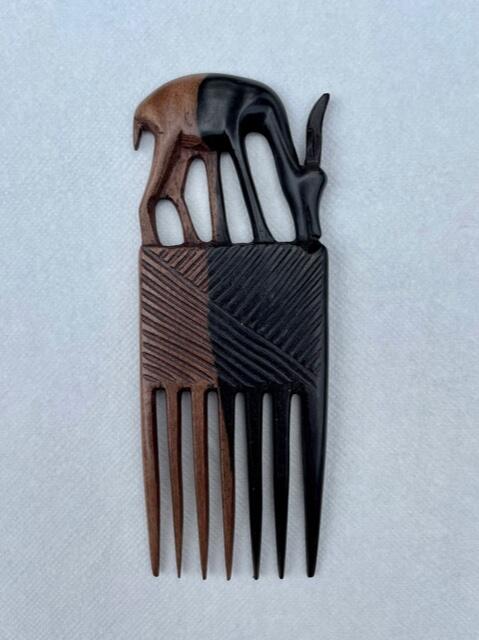 Hand-carved comb of wood, antilope